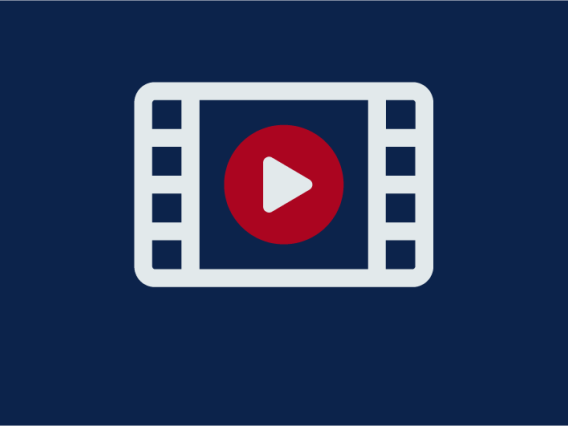 icon showing play button within film reel